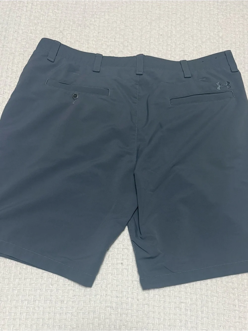 Under Armour HeatGear grey shorts, size 40